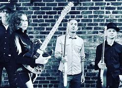 Karen Kuh; and Gang. And Freedy Johnston and Band